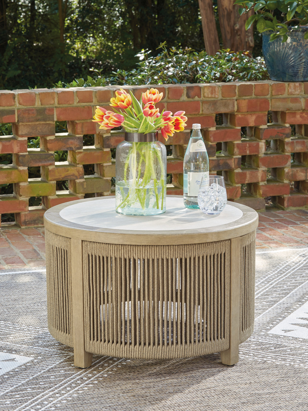 Furniture City - MS - Ashley Furniture - Spooners Cove Outdoor - Round Cocktail Table / Beige - PCP469-708